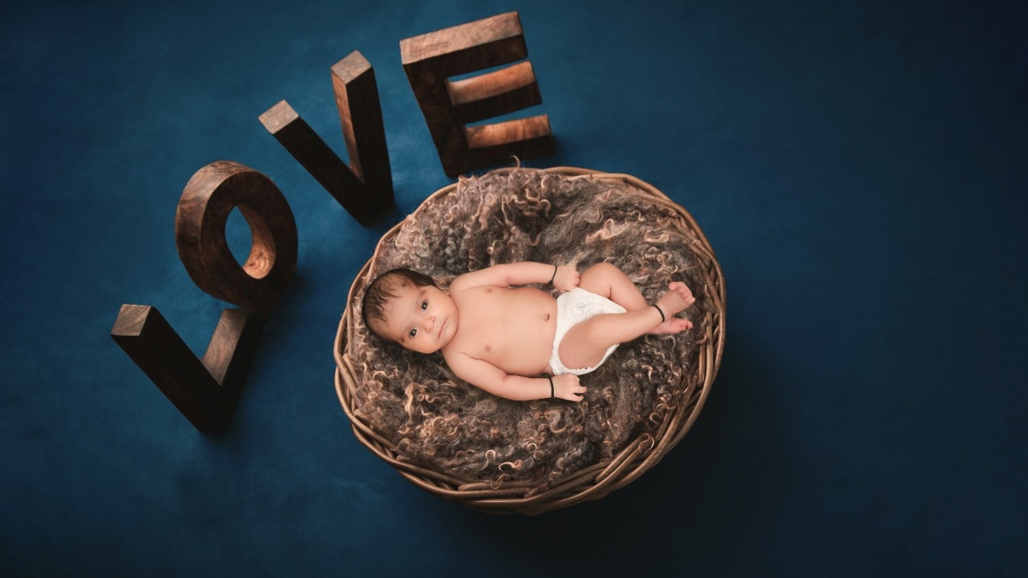 Newborn photo after editing by PhotoKrop